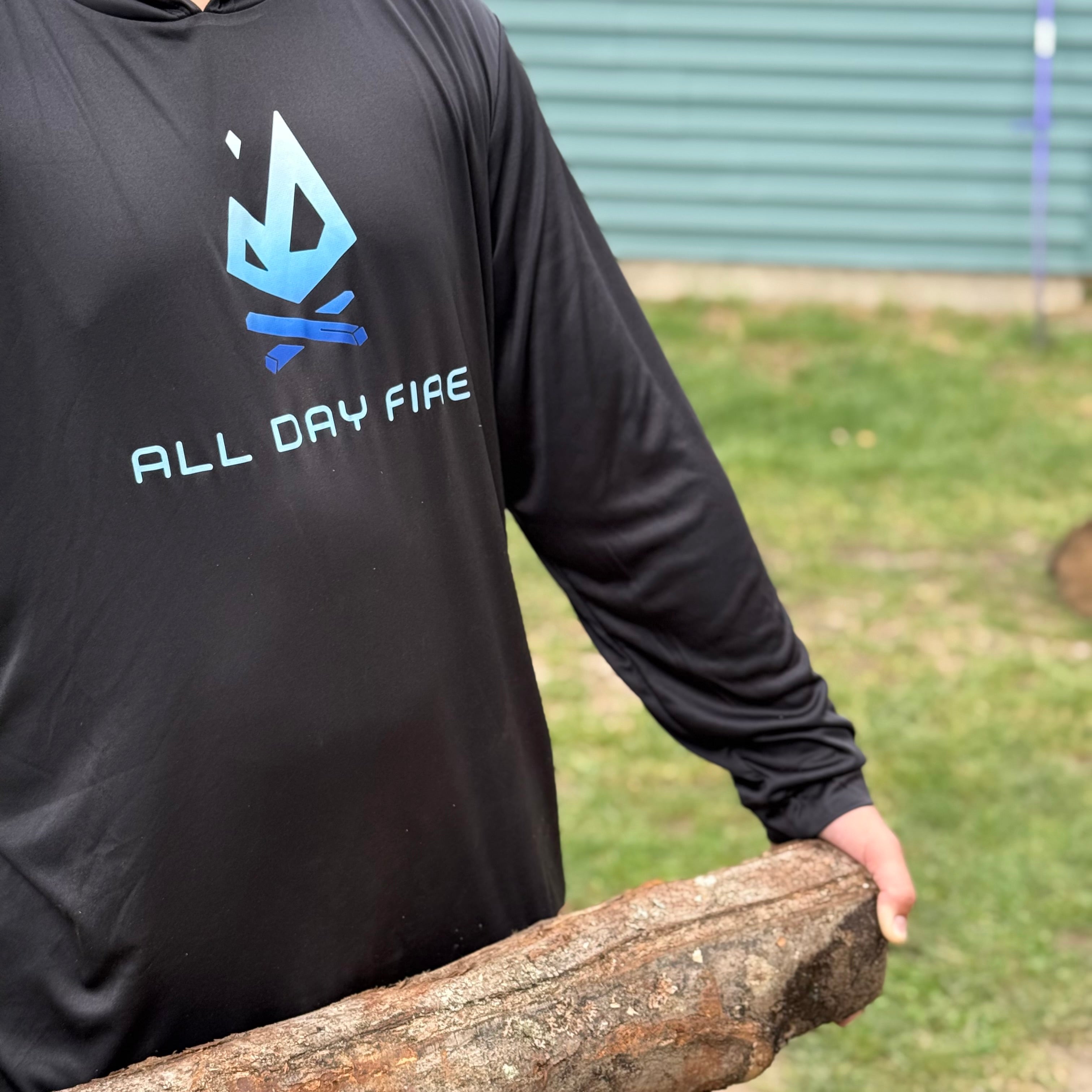 Black hooded tee with All Day Fire Outfitters logo. Lightweight performance fishing and camping shirt made for outdoor adventures.