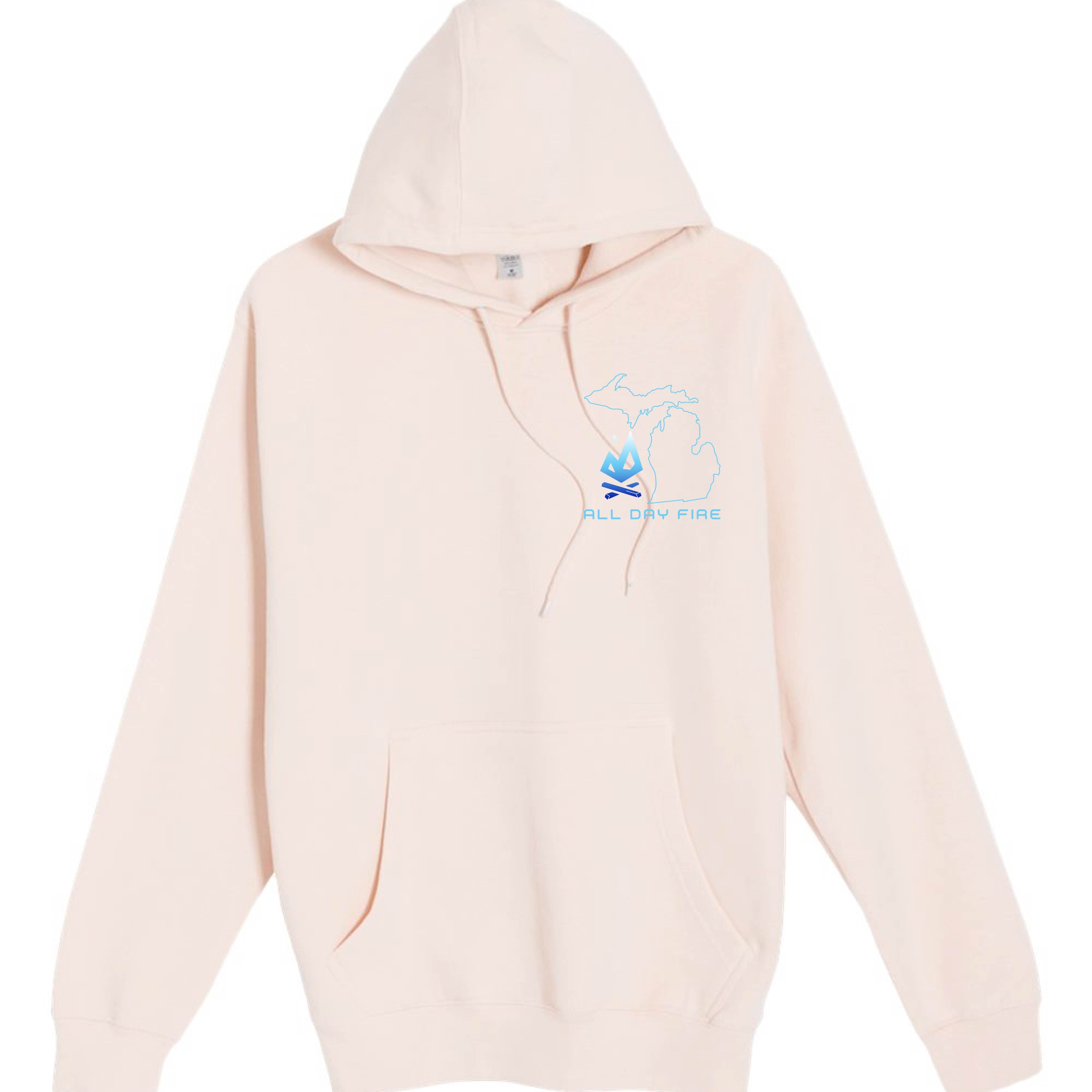Pale pink hoodie with the All Day Fire Michigan Edition logo design. Comfortable outdoor apparel celebrating Michigan adventure and family.