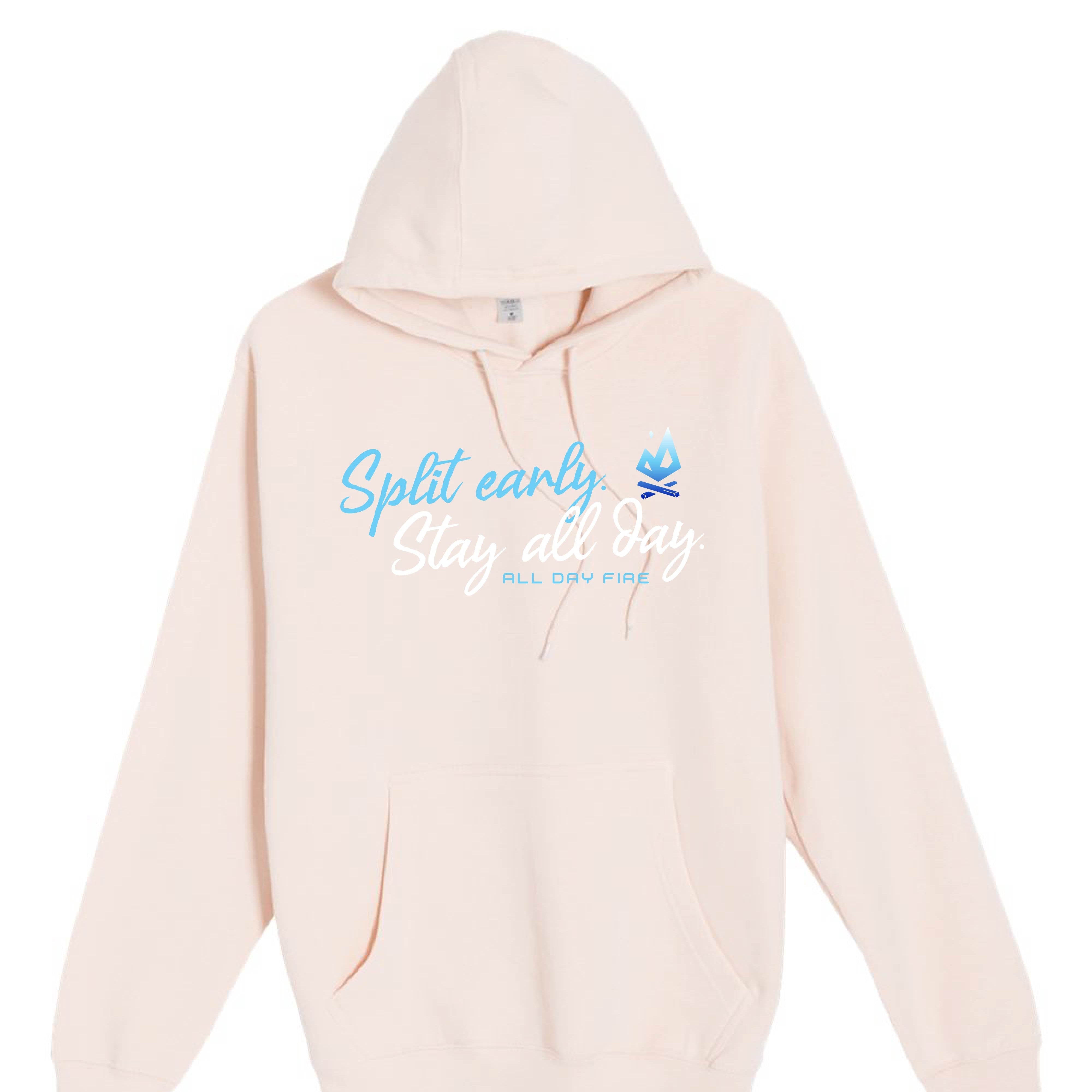 Pale pink hoodie with Split Early Stay All Day design and All Day Fire logo. Cozy, stylish outdoor apparel made for comfort and campfire living.