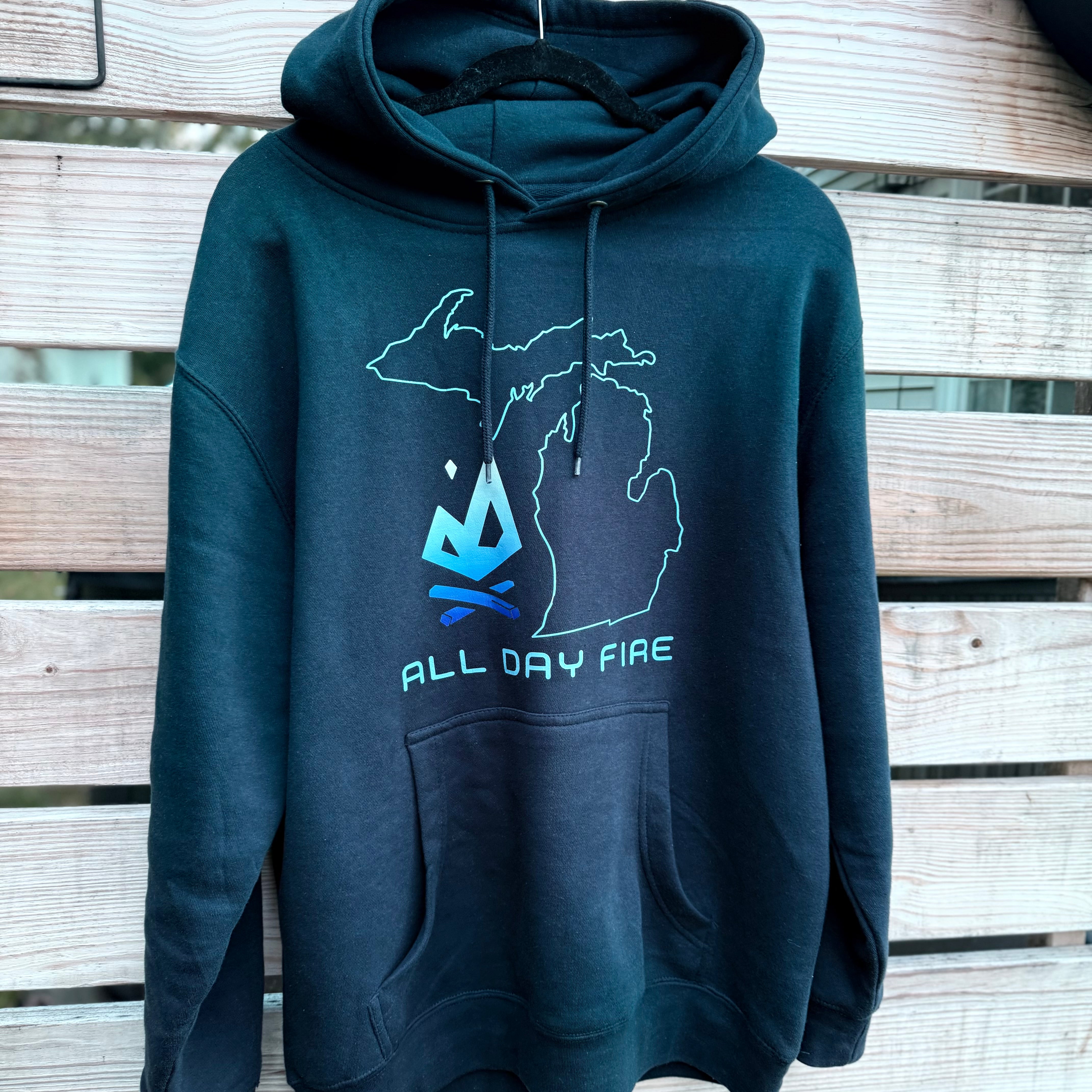 Navy Michigan camping hoodie with campfire logo by All Day Fire Outfitters