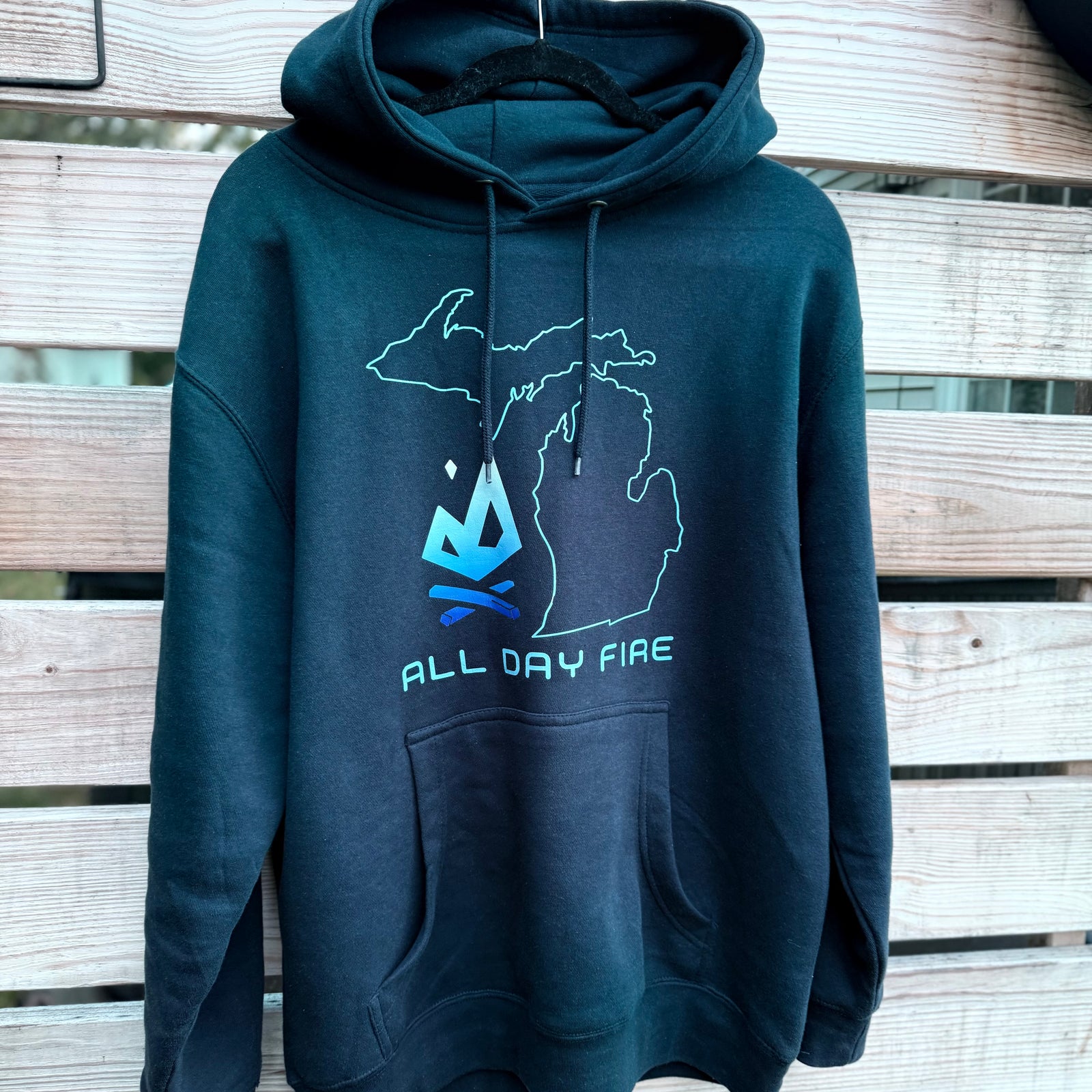 Navy Michigan camping hoodie with campfire logo by All Day Fire Outfitters